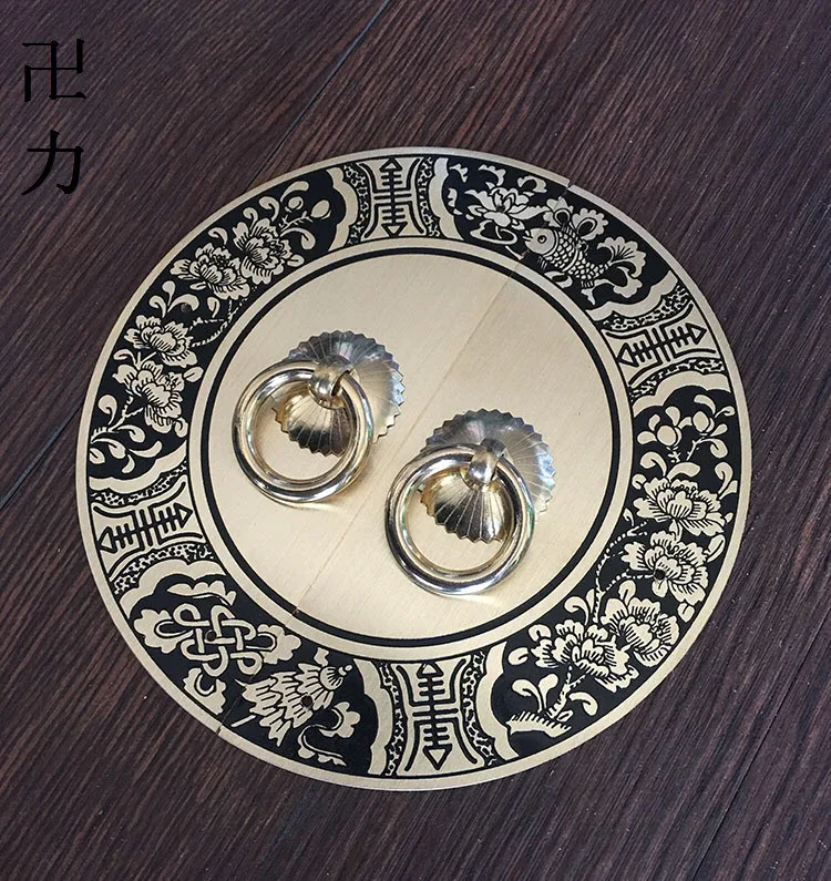 

The copper engraving plate handle round swastika Chinese antique copper bookcase wardrobe doors and windows cabinet doors copper