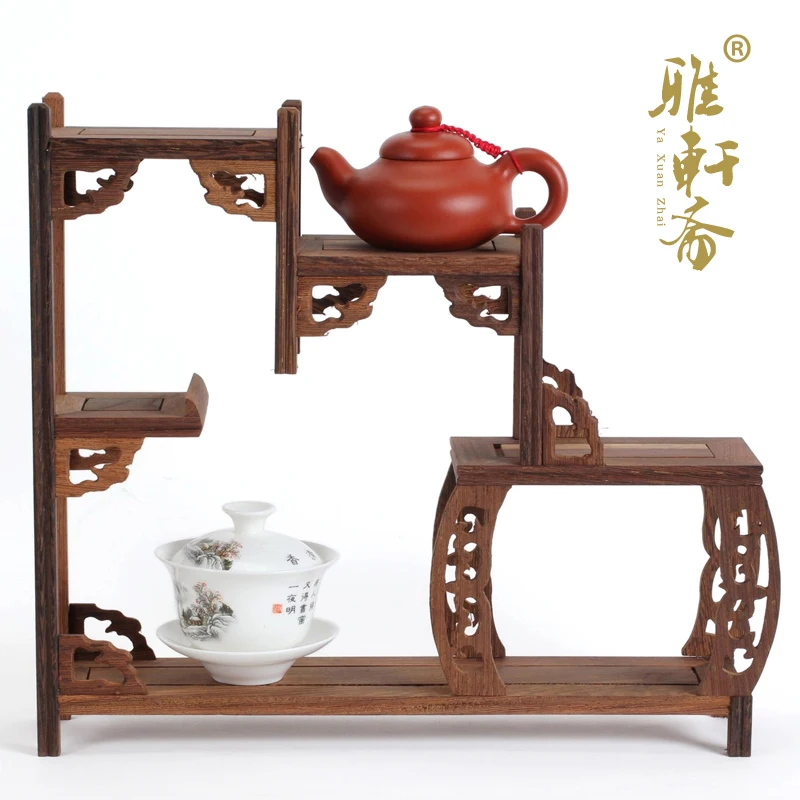 

Mahogany furniture base stone teapot rack shelf antique teapot wings carved mahogany base