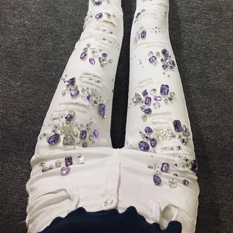 New Embroidered Flares Jeans Woman Fashionable White Hole Ripped Stretch Pencil Pants Diamond Casual Denim Trouser Female