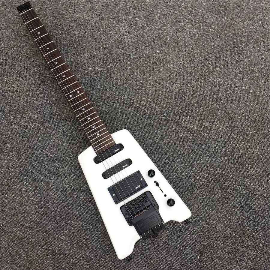 

Travel new white headless electric guitar, electric guitar, factory wholesale, all colors can be