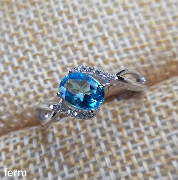 

KJJEAXCMY fine jewelry 925 sterling silver inlaid with natural blue topaz ring smooth curve is simple and bold