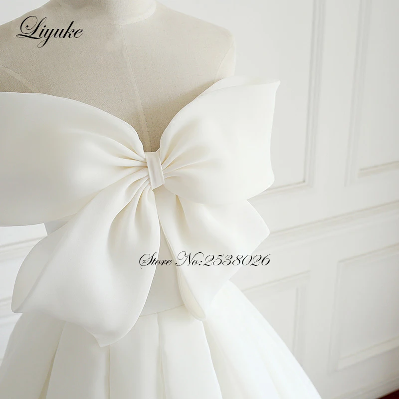 Liyuke Front Bow Design Strapless A-Line Wedding Dresses With Sleeveless Lace Up Closure Wedding Gown