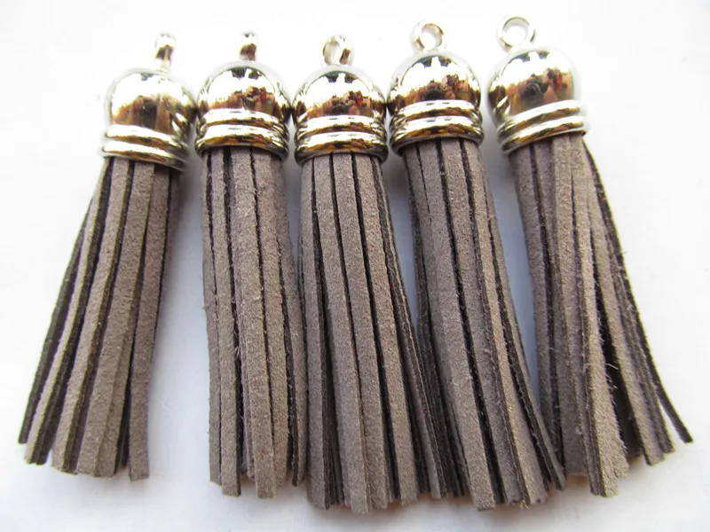 

Free Shipping 100Pcs 59mm Grey Suede Leather Jewelry Tassel For Key Chains/ Cellphone Charms Top Plated End Caps Cord Tip