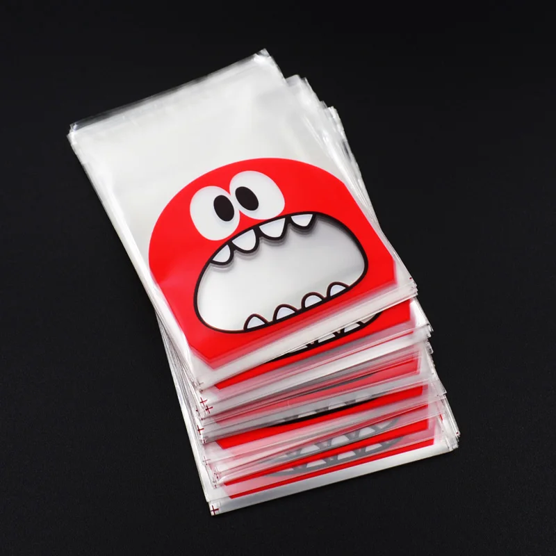 100pcs 7cm x 7cm+3 OPP Cute small Monster Sharp teeth Baking Christmas Gift Packaging Bags Wedding Cookie Candy Plastic bag