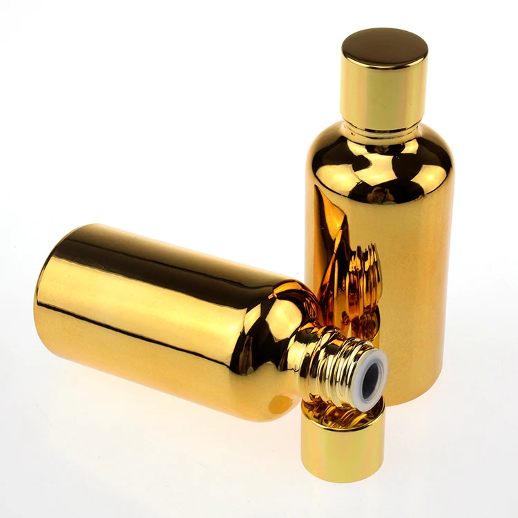 

empty 50pieces/lot 50ml High temperature gold plated glass Essential oil bottle, 50ml gold essentical oil bottle wholesale