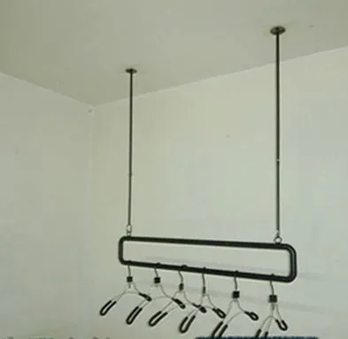 

, wrought iron wall clothing rack on the clothing store shelves, condole carries on the clothing rack Hang clothes rack