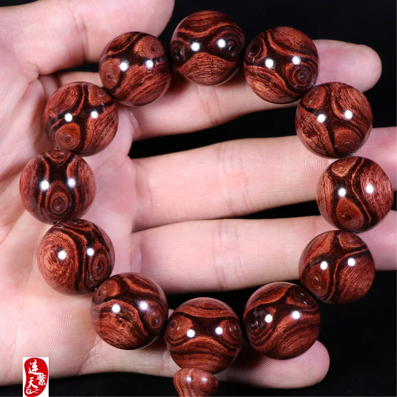 

Hainan Dalbergia Pear Hand String 2.0 Ghost Face to Eye Buddha Bead Bracelet Avocado Old Pear Material Buddha Collection Jewelry