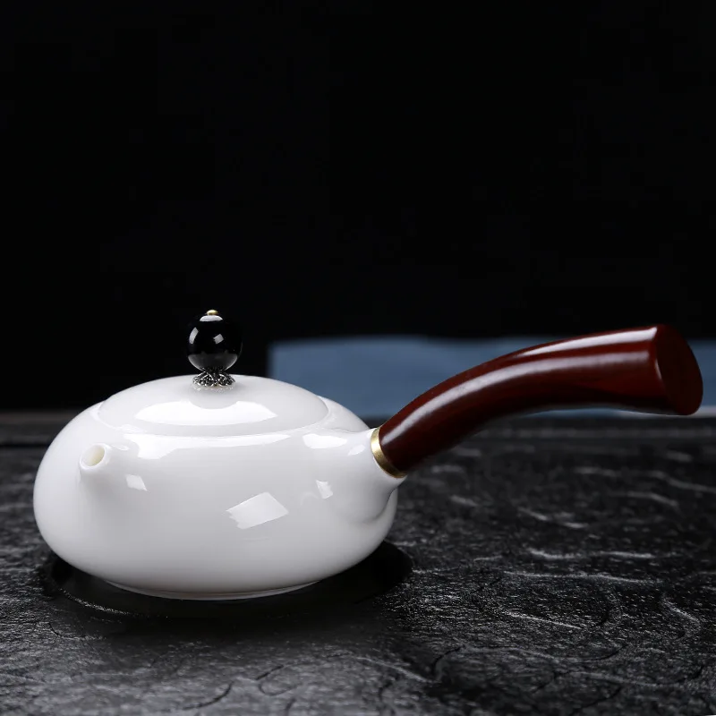 Dehua suet jade white porcelain Chinese household solid wood side teapot handmade teapot health