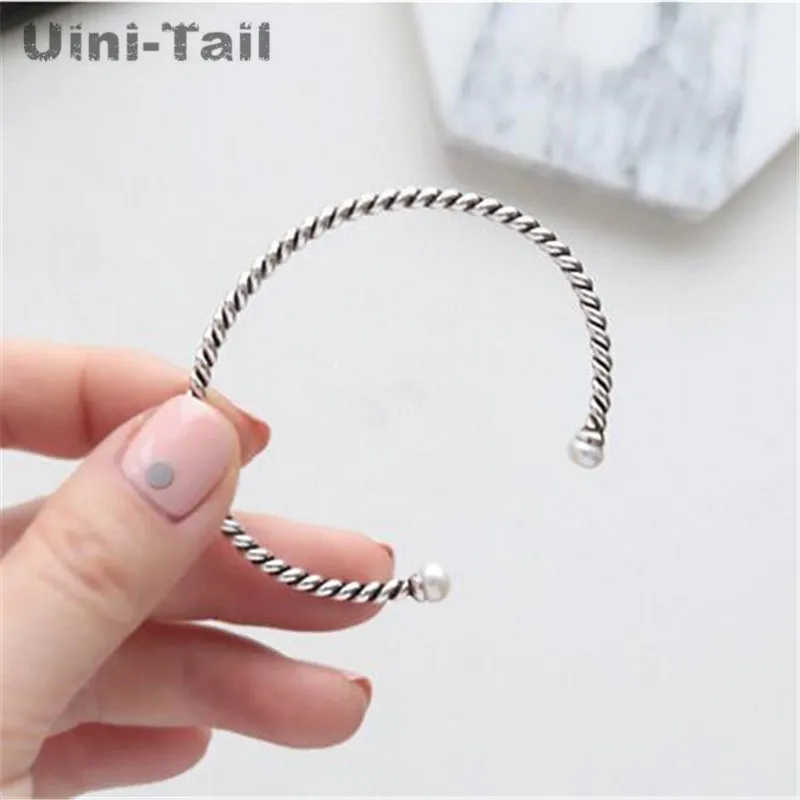 Uini-Tail classic hot 925 Tibetan silver Korean personality simple twist woven pearl bracelet Thai silver opening old bracelet