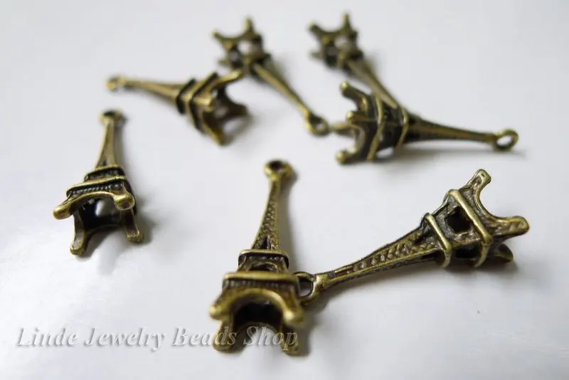 

Free Shipping!! 150pcs Eiffel Tower Model pendant charm Zinc-alloy Antique Bronze Colour In Wholesale