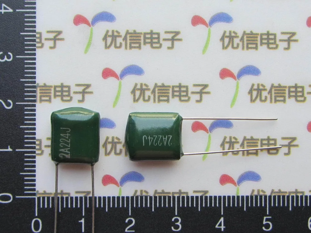 

Free ship with track 100pcs/lot 0.22UF 2A224J DIP polyester capacitor 2A224J 0.22UF 100V 220NF Dacron Capacitor 0.22uf 100V