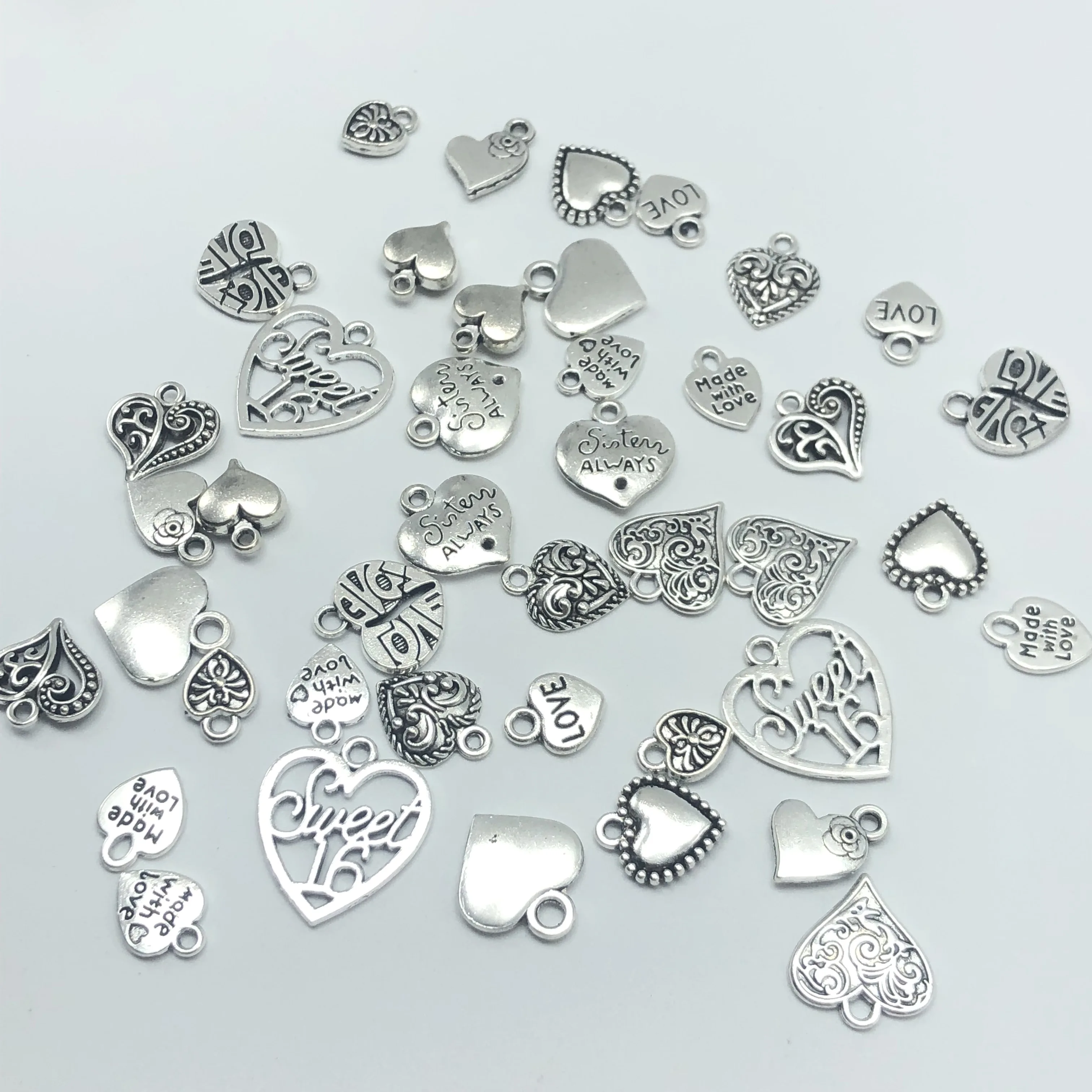 JunKang 30pcs Mixed batch Alloy Tibetan silver heart jewelry charm pendant classic DIY fashion findings