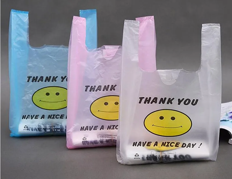 100pcs High Quality Thicker 5D Supermarket Yellow Lovely Smile White Vest Plastic Carrier Shopping Hand Bag Packaging Bags