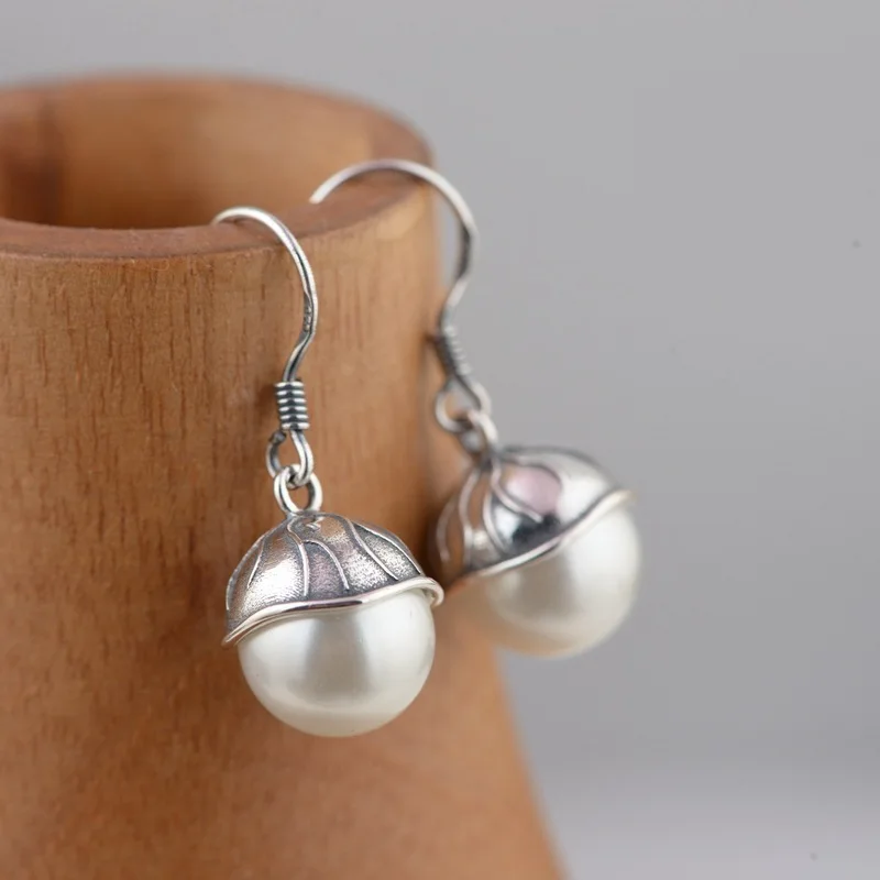 925silver female money gold with synthetic shell pearl has new gift earrings Thai silver wholesale element which style