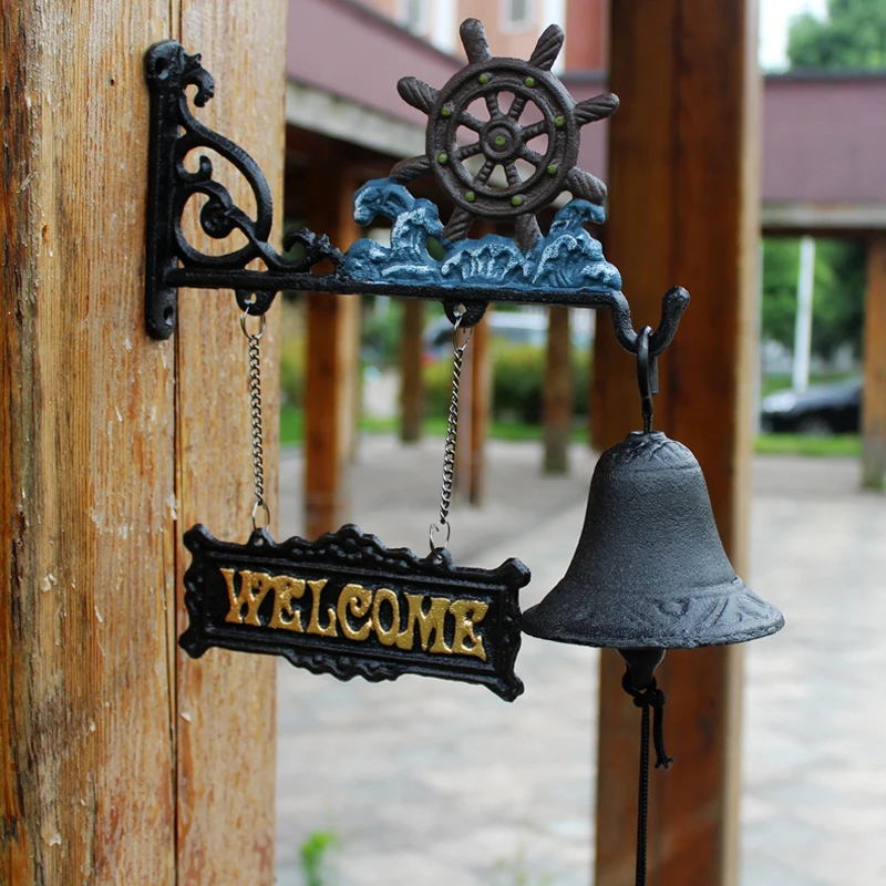 

Beach Blue Paint Rudder Cast Iron Wall Bell With Gold Welcome Signs Plaques Home Garden Decor Handing Cranking Welcome Door Bell