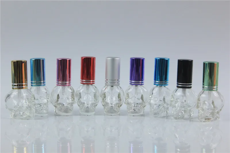 10 قطعة 8 مللي بوضوح الجمجمة شكل مصغرة صغيرة فارغة الزجاج عطر زجاجة عينة زجاجة مع الألومنيوم كاب رذاذ