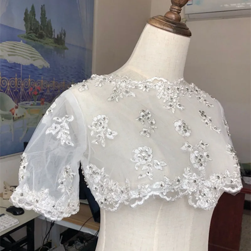 

Real Image Wedding Jackets Lace Applique Crystals Short Sleeve White Ivory Bolero Capes Sheer Boleros Custom Made Bridal Jacket