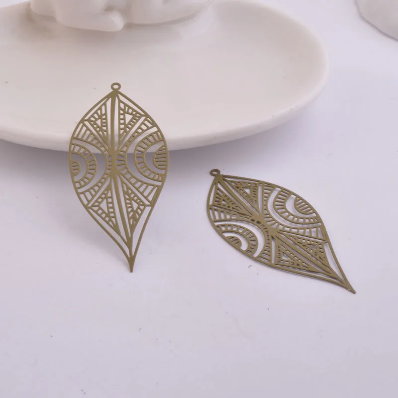 30 Stück AB5394 25*58mm zarte hohle Baumblatt-Ohrringanhänger, große Blätter, DIY-Schmuckzubehör – Detail 7