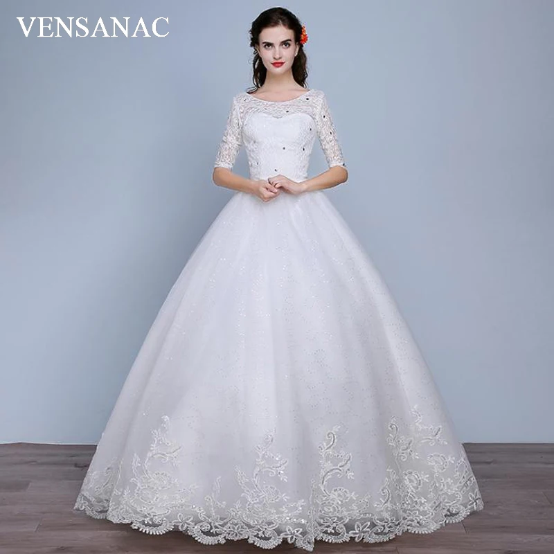 

VENSANAC Crystal O Neck Bow Sash Ball Gown Wedding Dresses Lace Appliques Illusion Half Sleeve Backless Bridal Gowns