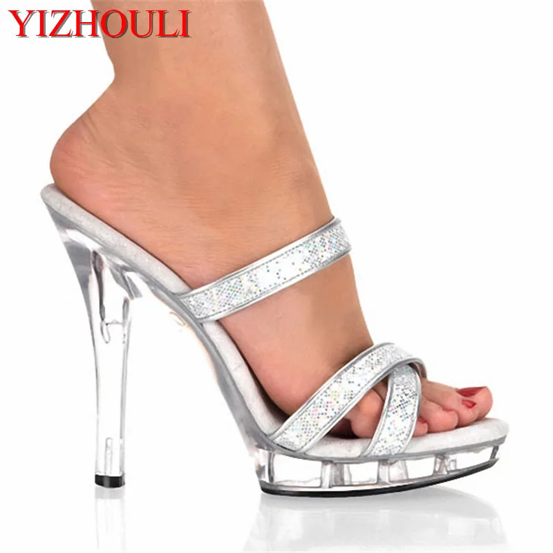 

Models walk the stage in sexy silver sequined heels and nightclub chic 13cm high-heeled sandals