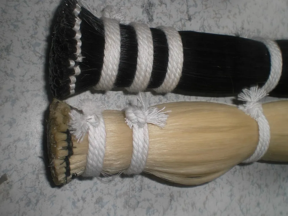 100 Hanks white bow hair 6 grams & 100 hanks Black bow hair 7 grams all in 32 inches