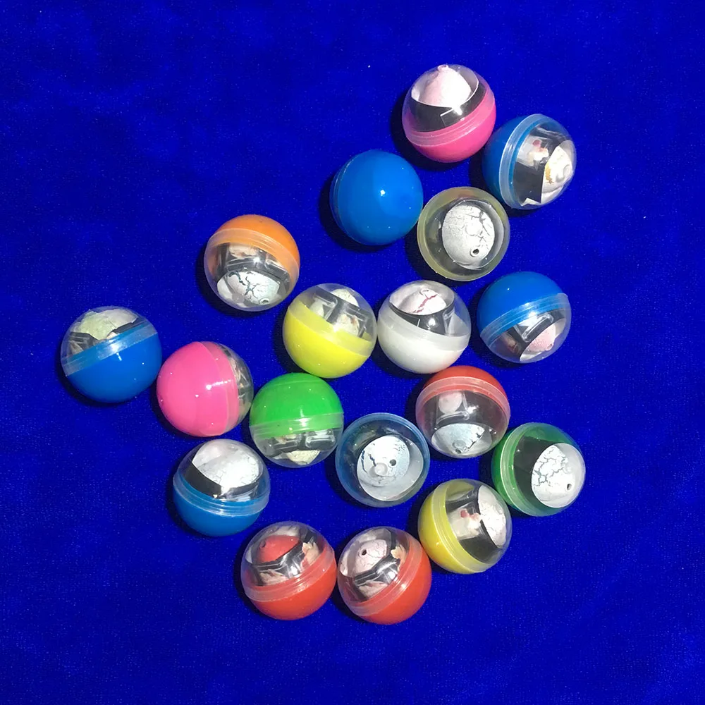 60 pcs/lot 32mm capsule en plastique jouet eau à couver oeuf de dinosaure rempli de boule en plastique jouets Surprise enfant jouets Surprise balle