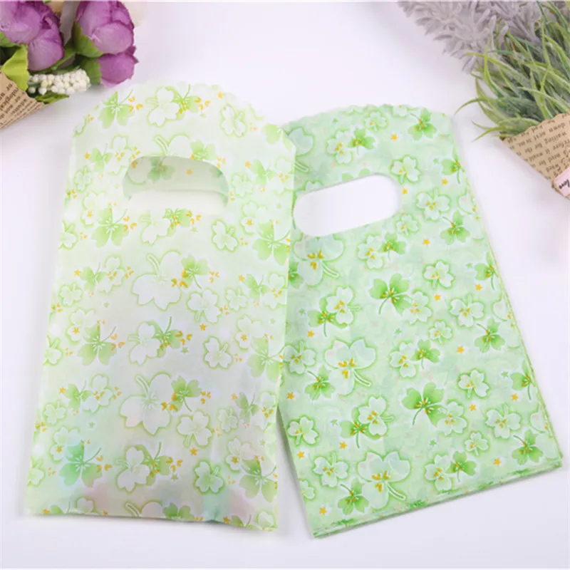 50pcs/lot 9*15cm High Quality Luxury Gift Packaging Pouches with Green Flower Small Sachet Plastique Bonbon