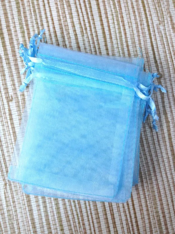 

Free shipping 100pcs 9x12cm sky blue color Drawable Organza Bags Wedding Christmas Gift Packaging Bags Pouches