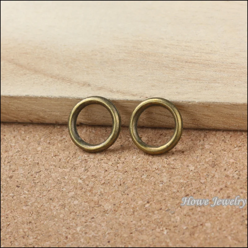 

Wholesale vintage 200pcs antique bronze jump rings pendant charm diy jewelry Findings 9mm hole dia 10092