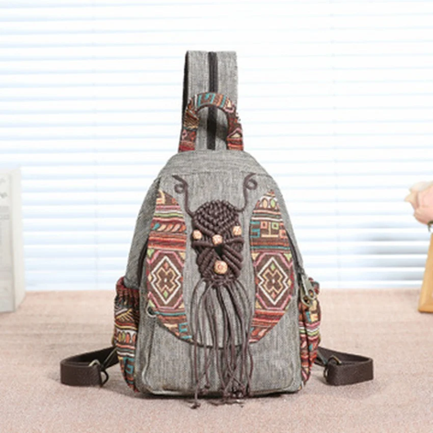 New Chinese style ethnic wind hand-woven leisure travel vacation retro fashion wild literary canvas fabric backpack