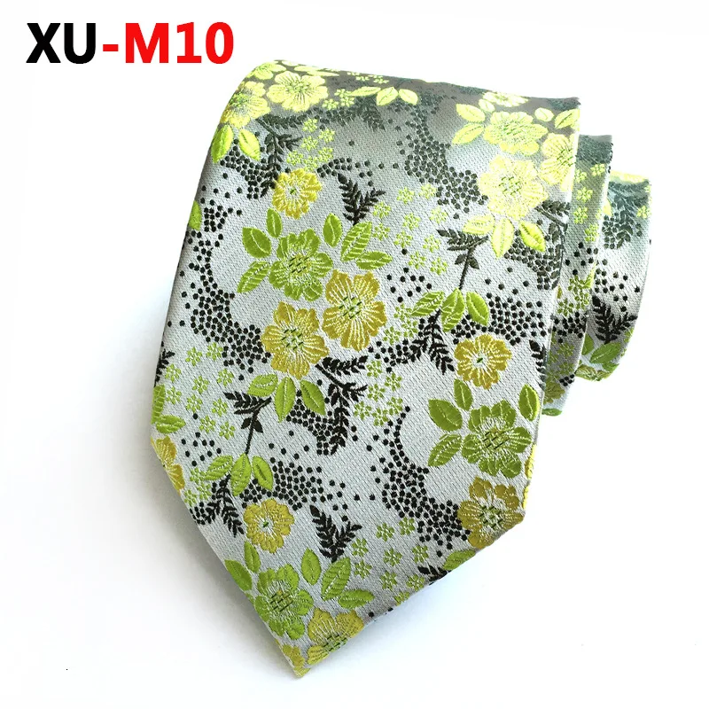 Delicate 8cm green and white dotted with floret tie, office tie