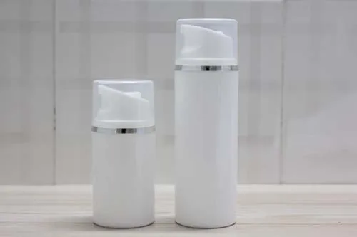 100ml white airless  pump  bottle with silver Line and clear cap ,100 ml vacuum airless Cosmetic Container with silver line