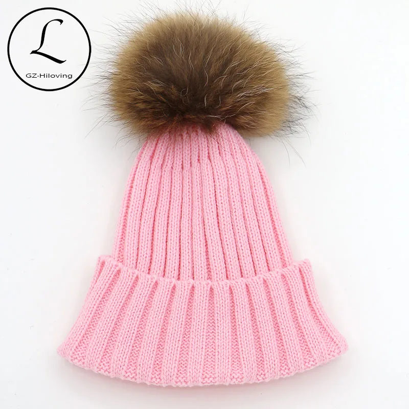 

GZHILOVINGL Big Pompoms Custom Knitted Pom Beanie Hat For Women Men Winter Natural Raccoon Fur Winter Warm Hats China Factory