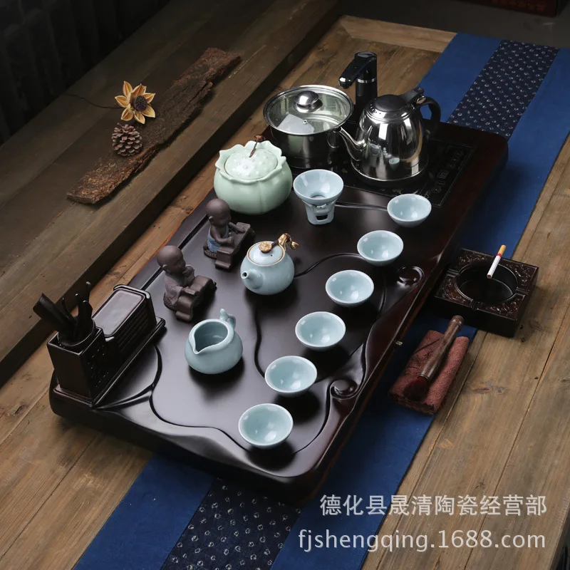 Four-piece ebony tea tray cooker Yixing Stoneware Ru tea sets tea table tea sea new