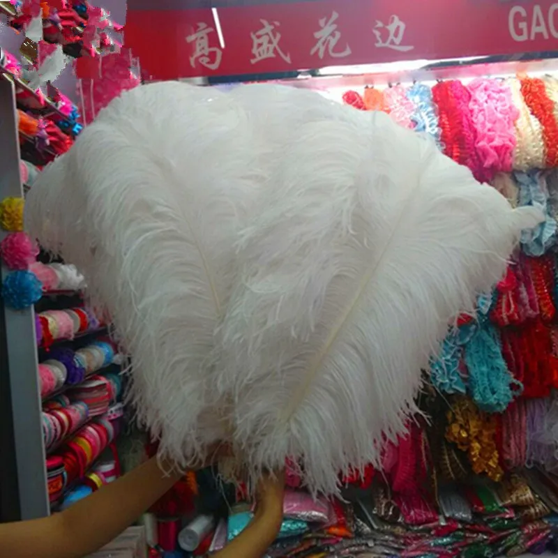 

High quality 10PCS Thick pole ostrich feather white ostrich plumage 55-60cm / 22-24 inches plume artware performing decorations