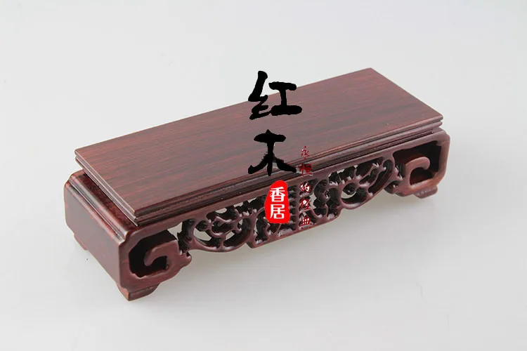 

A mahogany red sandalwood wood scroll base rectangular hollow carved jade stones base longevity ornaments