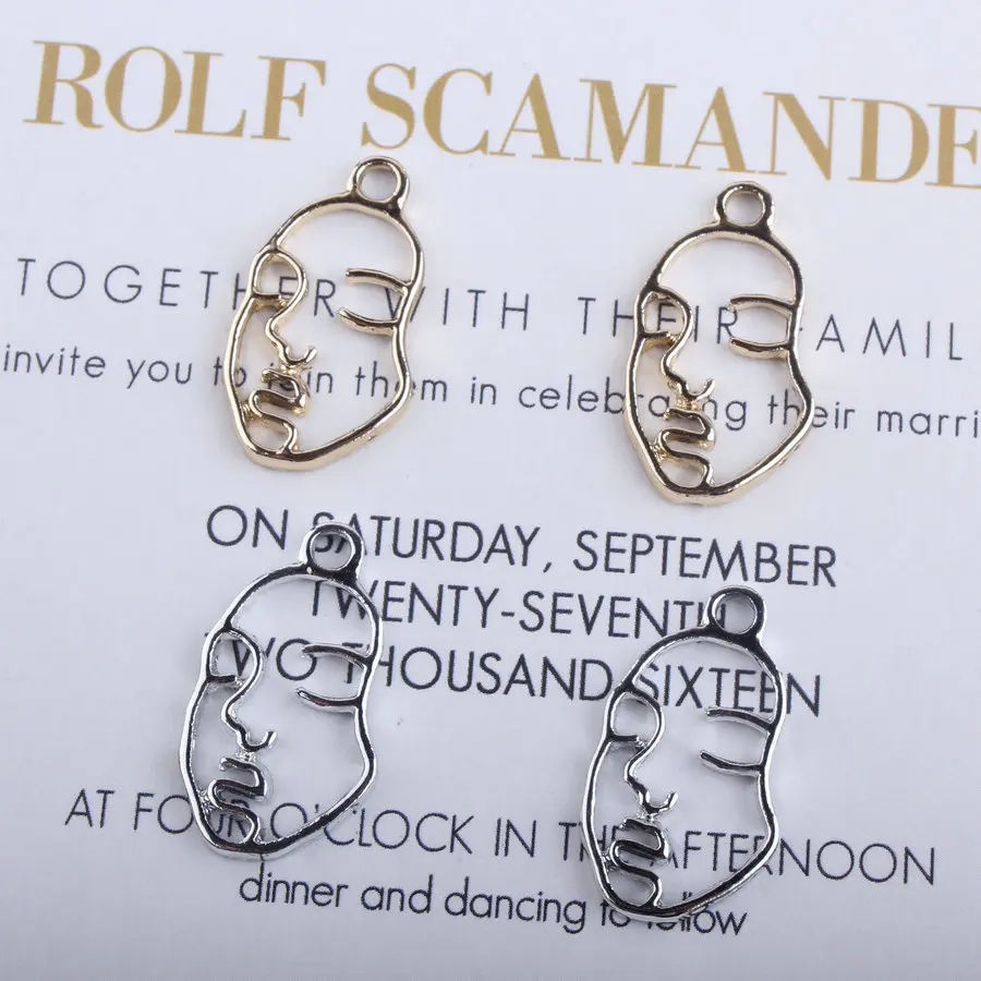 

Wholesale 100PCs 12*23MM Hollow Out Human Face Alloy Charms DIY Jewelry Findings Ornament Accessories Necklace Pendant Earring