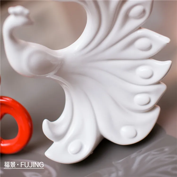 

Special ceramic crafts modern home accessories wedding gift ornaments red and white peacock ornaments wholesale furniture