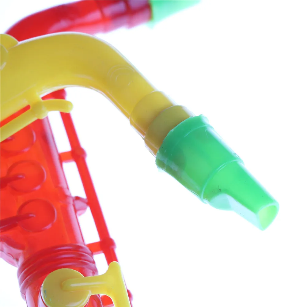 Saxofón Musical de aprendizaje de plástico, instrumento Musical de plástico para bebés y niños, juguetes de Educación Temprana, 21cm