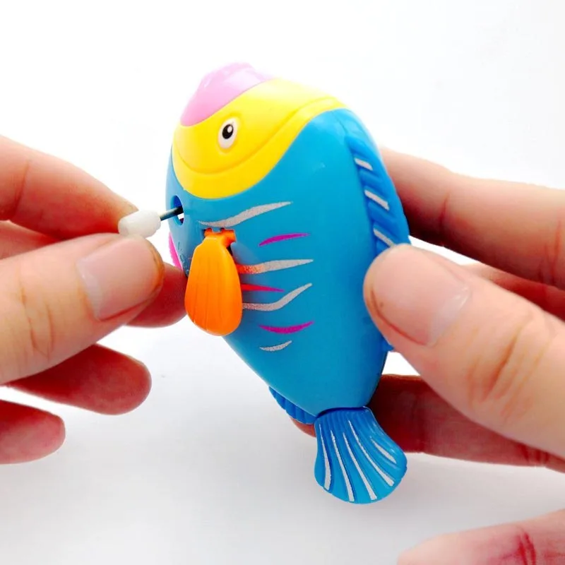 Giocattolo a Catena con Pesciolini Colorati a Molla per Bambini, Alimentato a Batteria, Regalo Educativo per Neonati, Giocattolo Attivabile