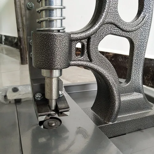 pressa per occhielli semiautomatica per materiali pubblicitari