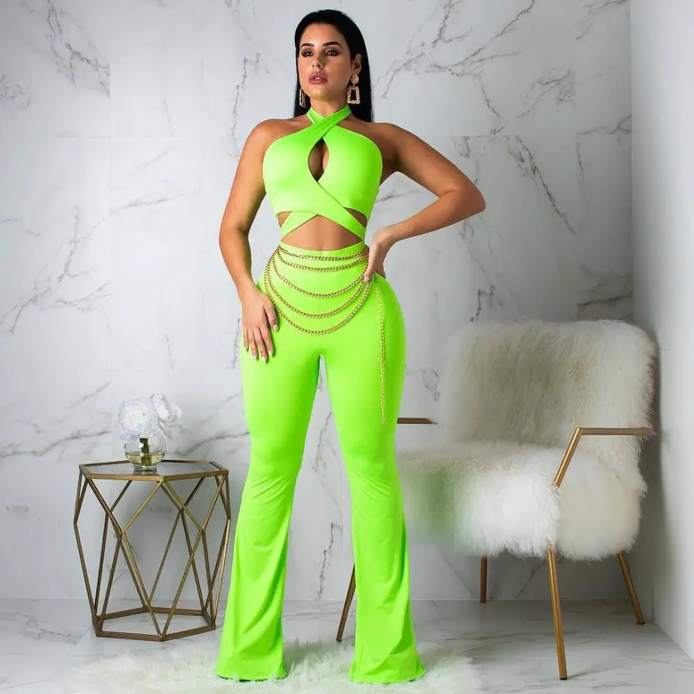 

BKLD 2019 Neon Green Romper Women Sexy Halter Hollow Out Jumpsuits Summer Clubwear New Ladies With Chain Backless Loose Jumpsuit