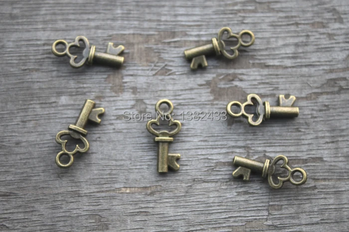 50pcs--Key charms,Antique Tibetan bronze Mini Filigree Flower key Charm Pendant 8x16mm