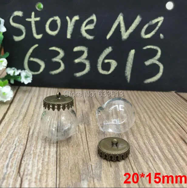 

Free ship!!! 50sets/lot 20*15mm glass globe & 15mm bronze crown base set glass globes charm glass vial pendant glass cover orbs