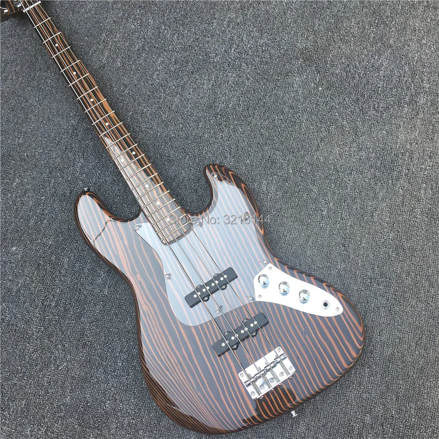 New zebra wood four string electric bass, real photos, factory wholesale. Can be modified