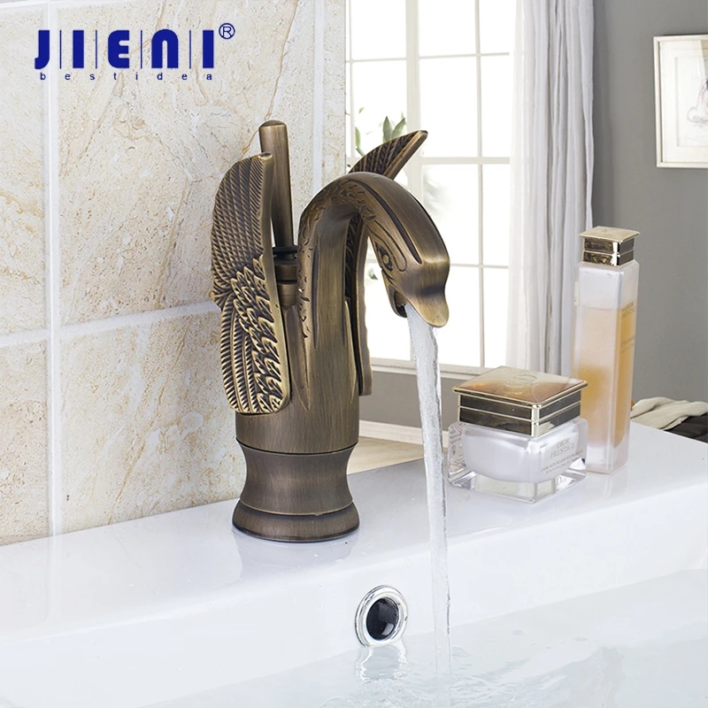 

JIENI Antique Brass Swan Wing Finish Stream Spout Faucet Hot & Cold Mixer Counter Top Tap Bathroom Basin Sink 1 Handle Faucet