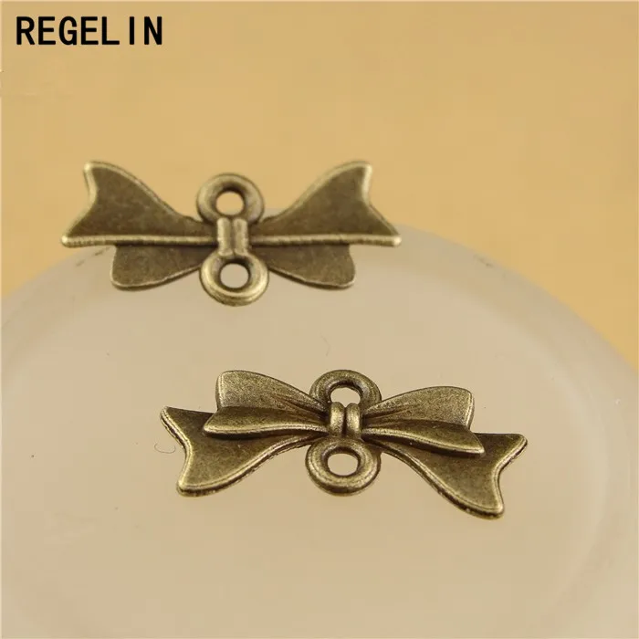 REGELIN Charms Bow Tie Connectoren Hanger Antieke bronzen Zinklegering 50 stuks 21x10mm Fit Armband Ketting DIY sieraden Bevindingen