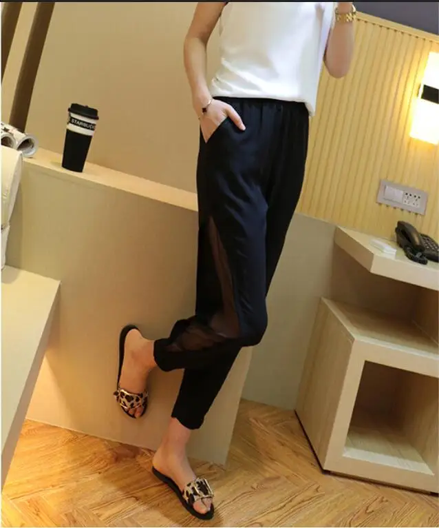 

New spring and autumn black female harem pants high waist was thin nine points pants side slit chiffon perspective trousers