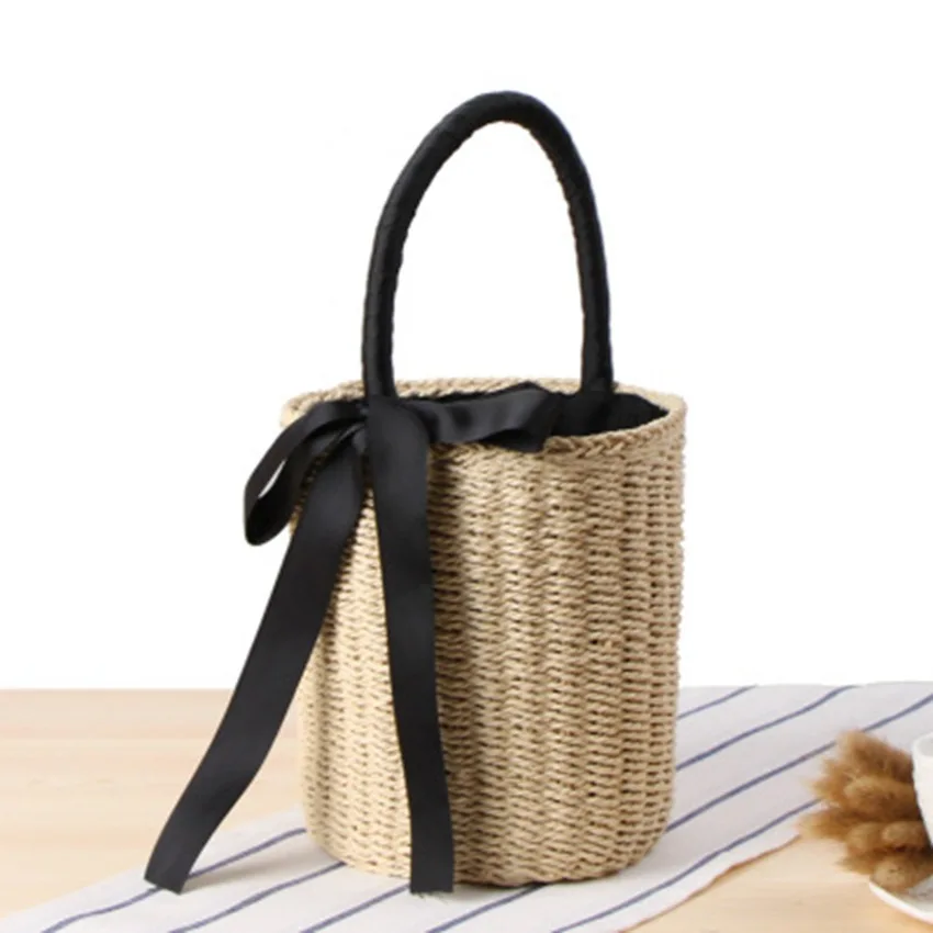 New cylinder hand carry straw bag national wind summer vacation woven bag portable bucket ribbon casual beach bag