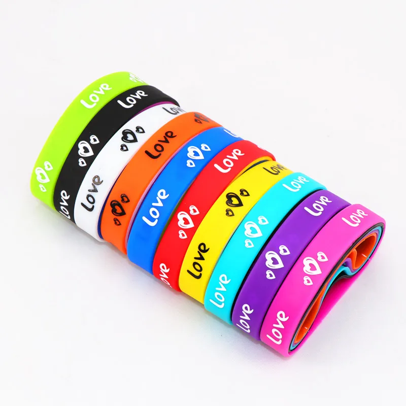 Pack of 100pcs Multicolor Elasticity Jesus Cross Skull Peace Butterfly Etc Style Wrist Cuff Silicone Bracelets For Man Women